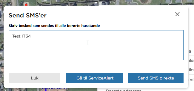 Vinduet Send SMS'er med besked og knapperne Gå til ServiceAlert og Send SMS direkte